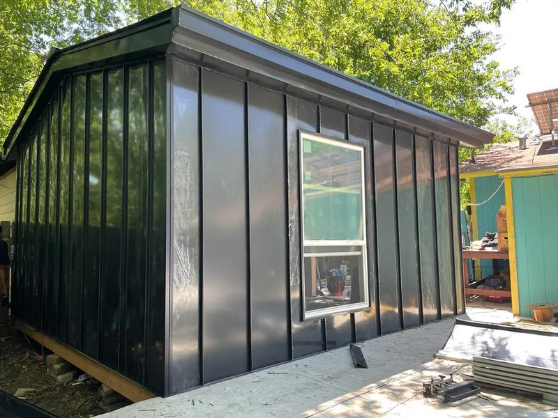 Black standing seam metal wall panels for Metal Roof Installation in East Goshen